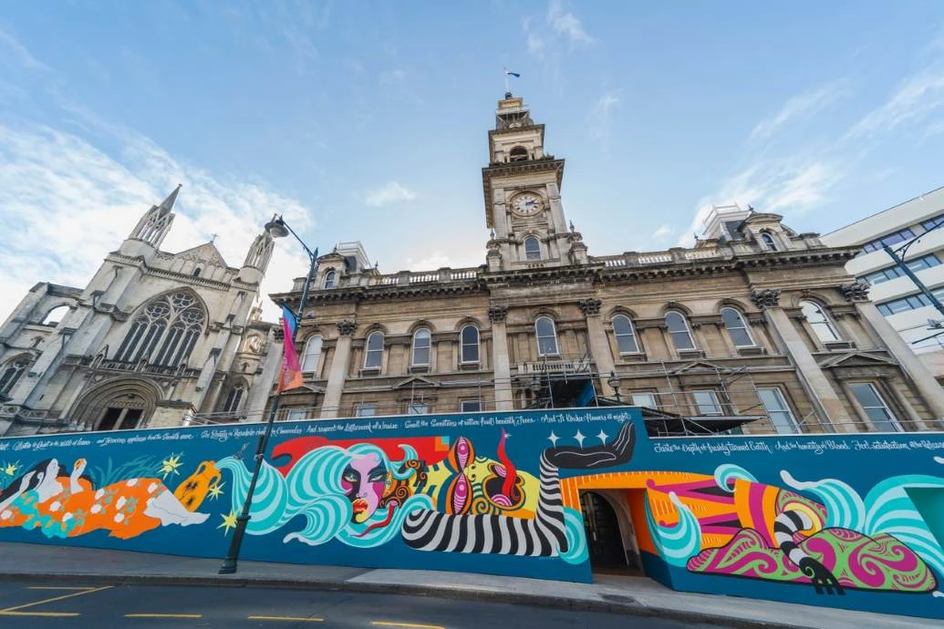 Street Art Trail Chambers A colourful mural on hoarding wrapped around the bottom half of the Dunedin Municipal Chambers.