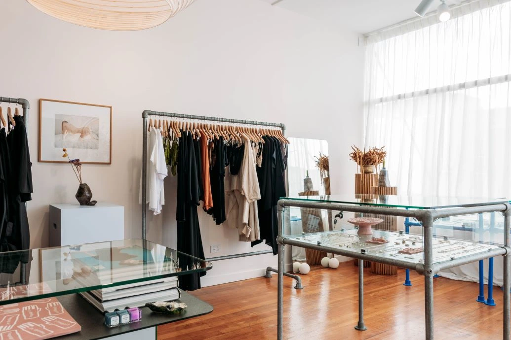 3be4e5fb8813ae9f79385225e6d2116ef6c6e193.webp Interior of Company Store boutique.