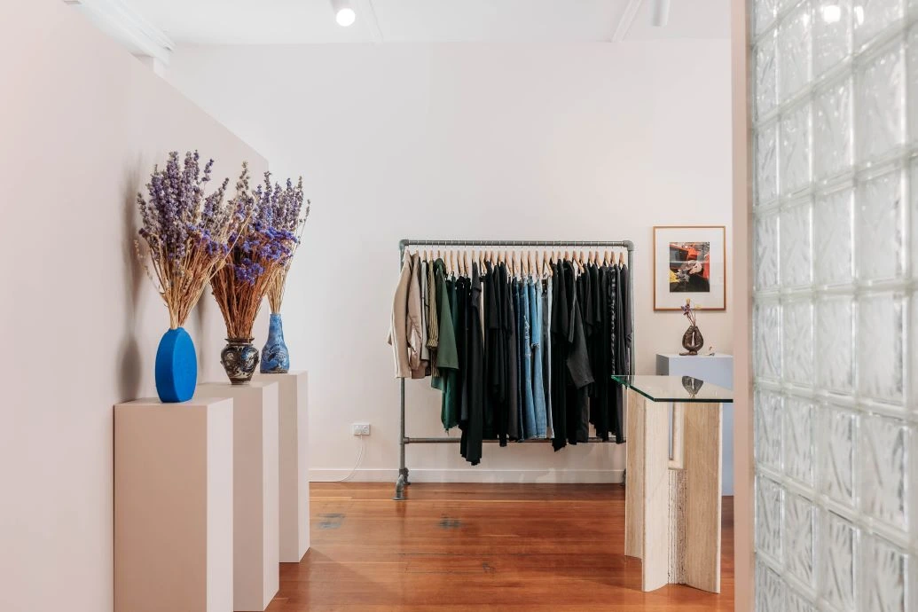 6e749ab7789750c4e7d2b36bd5bc763df0266b5f.webp Interior of Company Store boutique.