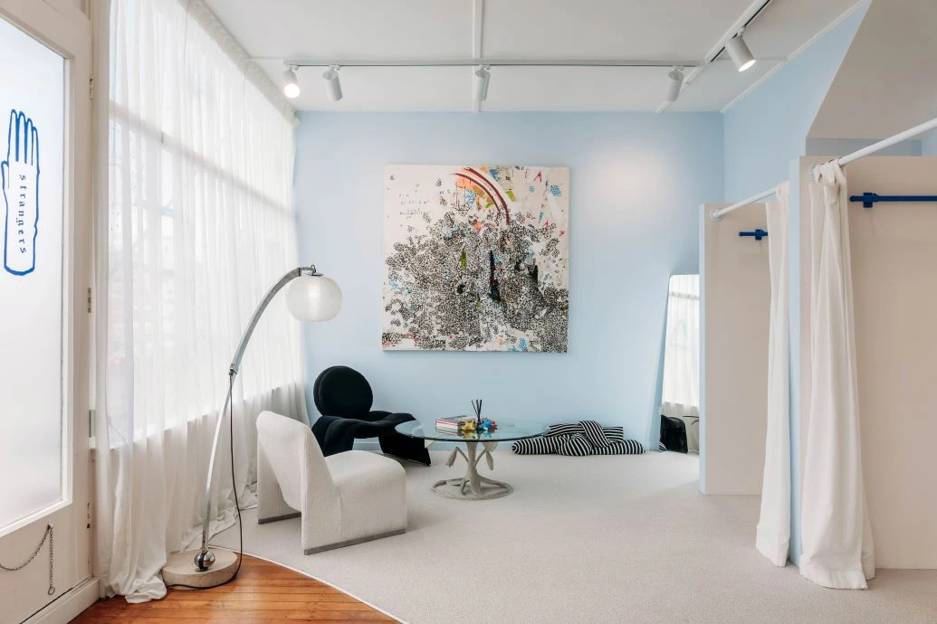 baec97d0f5c829d21edda89af772c91c1b4aee7f.webp Interior of Company Store boutique.